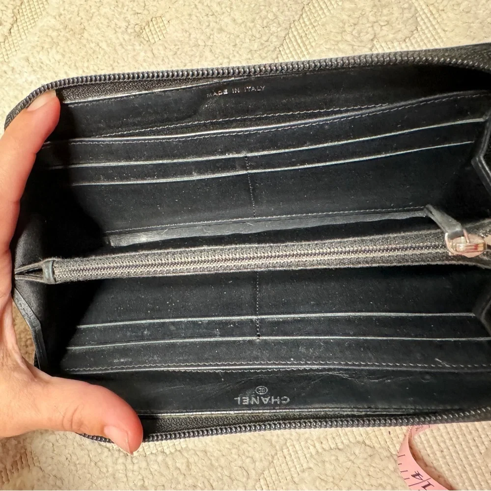 Authentic  Chanel Camelia patent leather zip around‎ wallet long